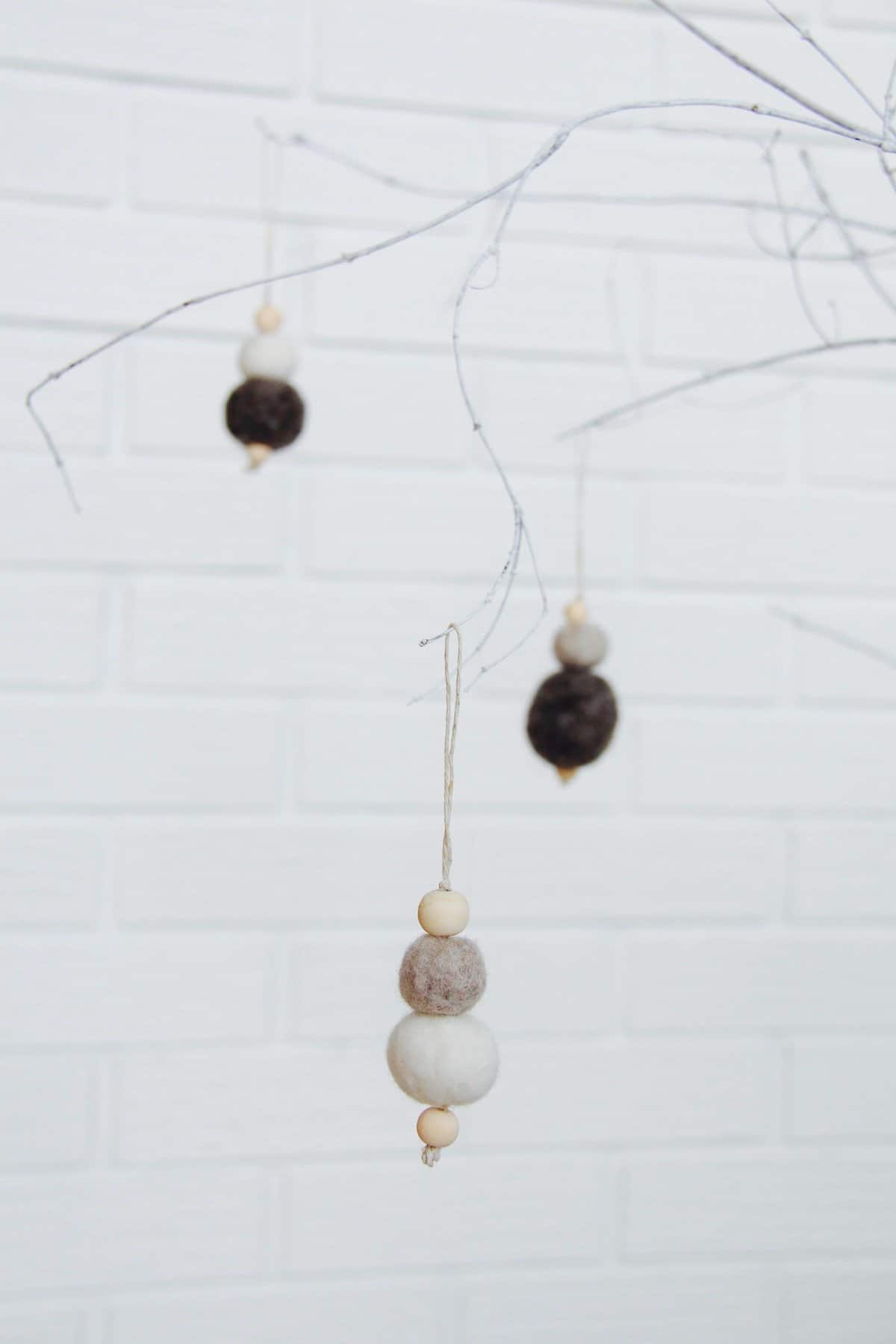 minimalist felt ball ornament with wooden beads