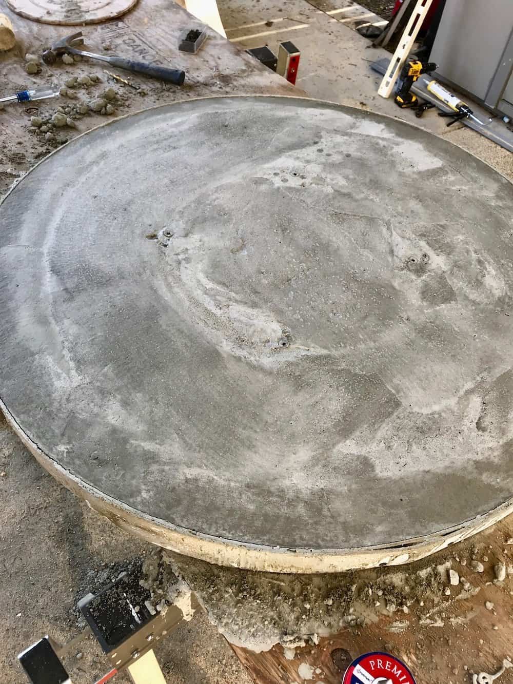 Round concrete dining table made for the patio