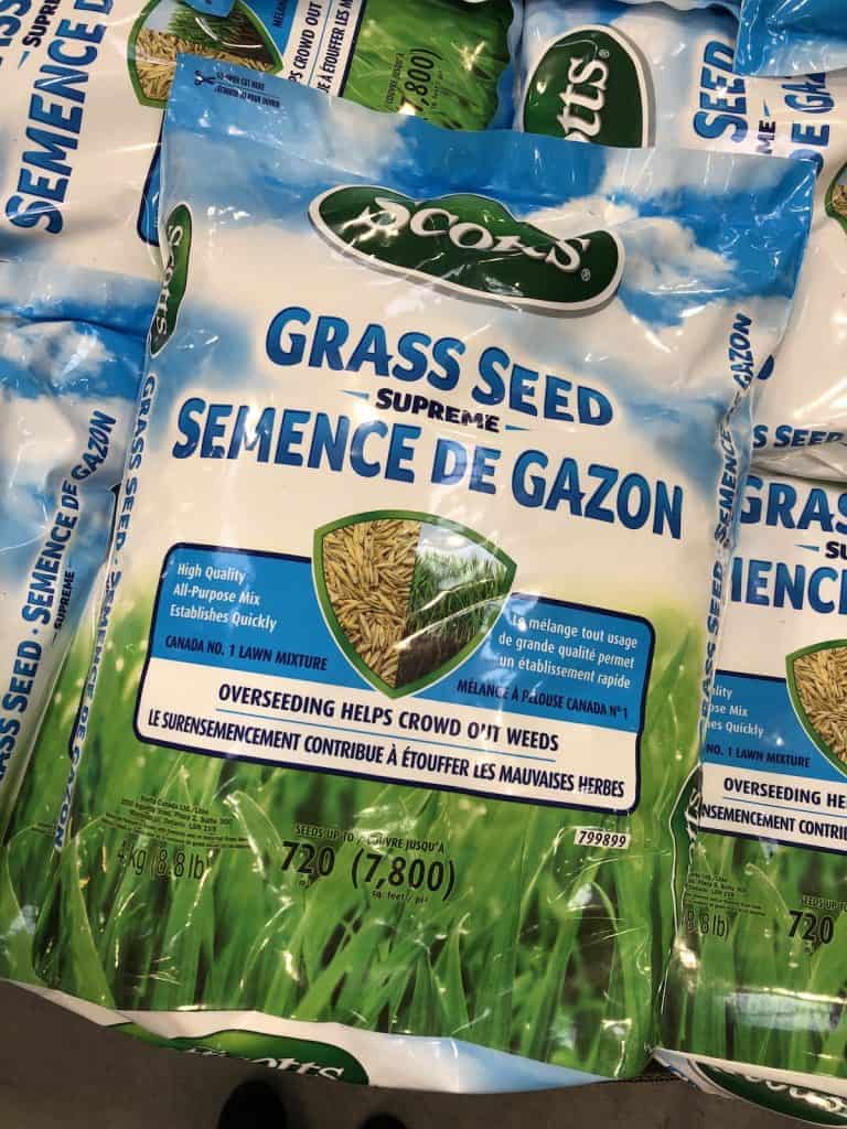 Bags of grass seed - scotts grass seed supreme - blue with green photo of turf grass lawn