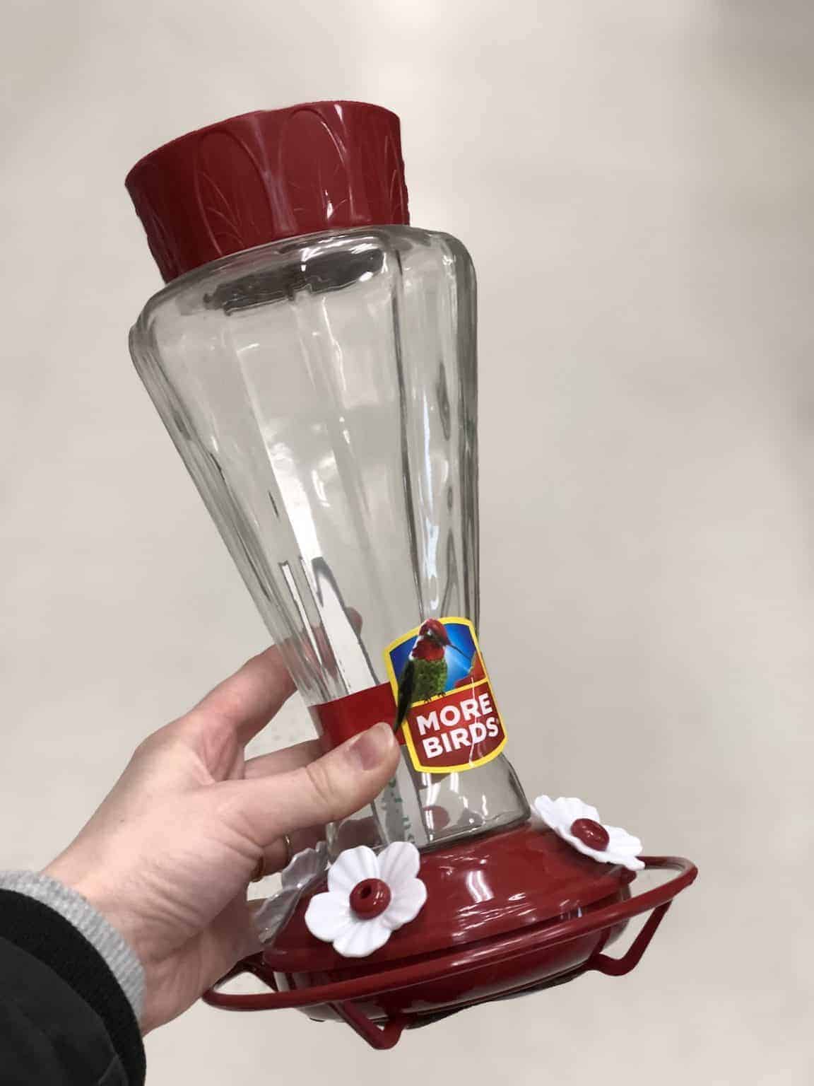 Hummingbird feeders in your garden 🌺🦩 Create a vibrant and lively bird