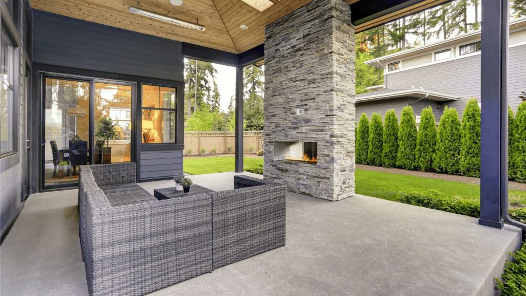 Covered patio with exterior fireplace