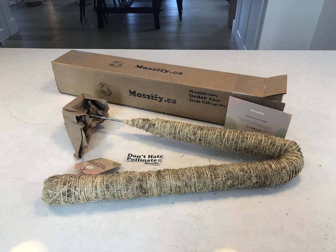 Moss pole bent in half inside shipping box - flexible moss pole